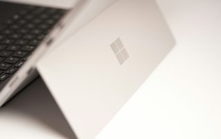 white-laptop-computer-on-white-table